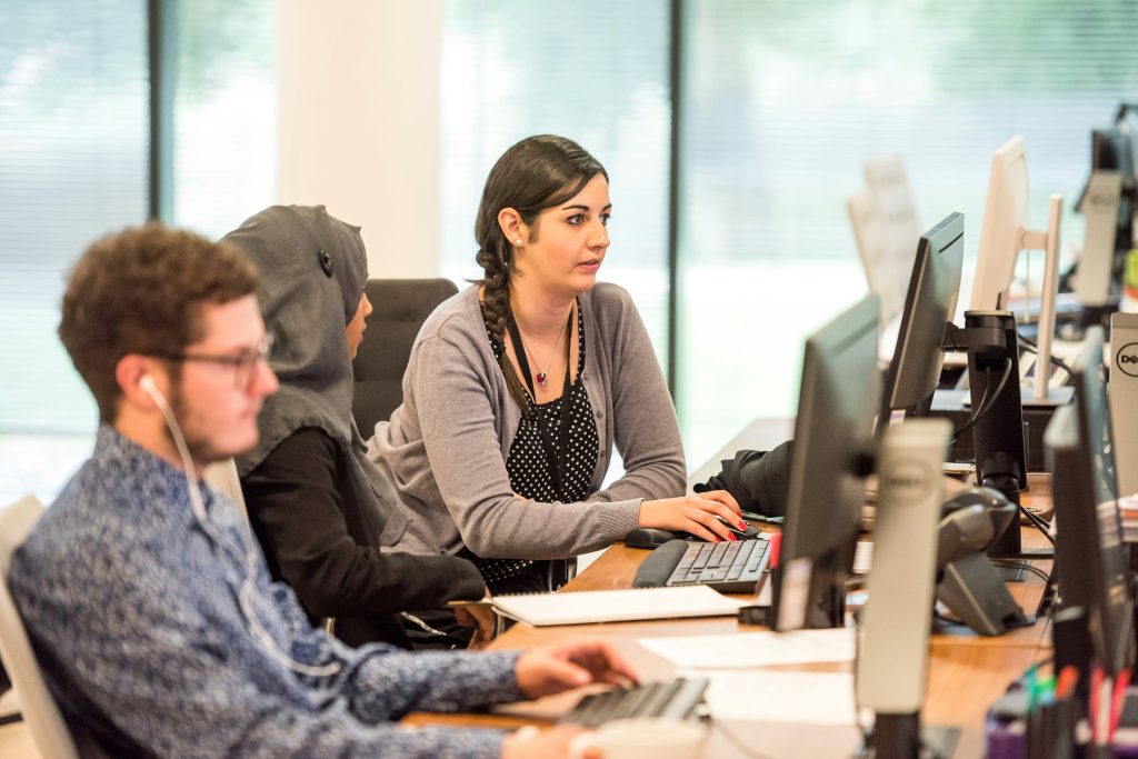 people sitting working together